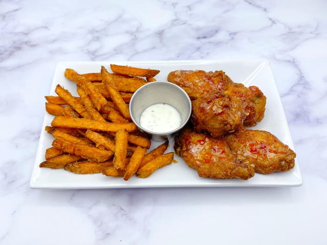 Honey BBQ Wings (5 pcs) & Sweet Potato Fries.