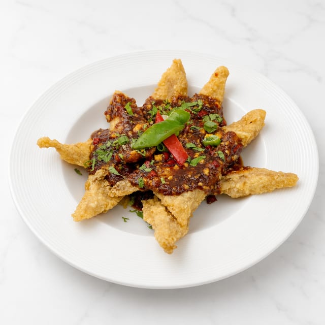 Golden Tilapia - Ka Praw Spicy Basil Sauce.