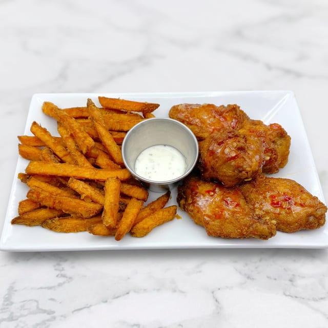 Sriracha Chili Wings (5 Pcs) & Sweet Potato Fries.